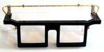 bench magnifier head wearing glasses